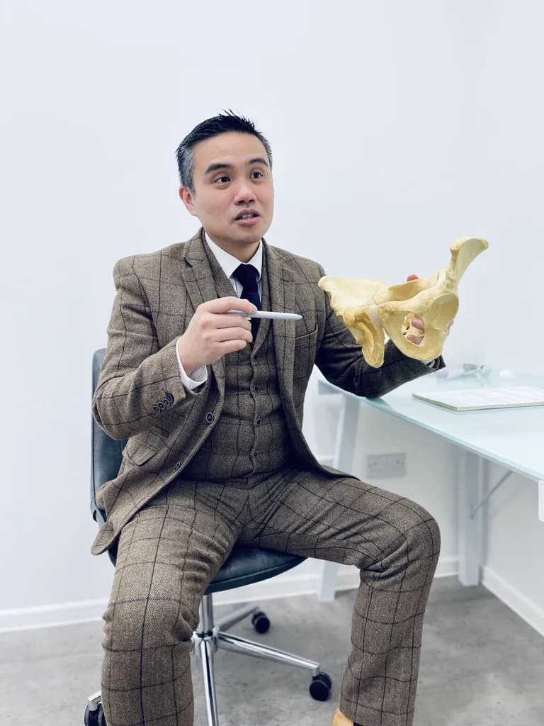 Professor Lee explaining the hip with a model